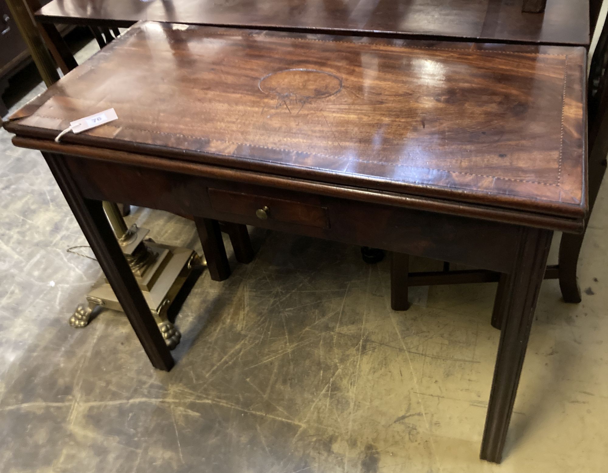 A George III rectangular inlaid mahogany folding card table, width 88cm, depth 41cm, height 73cm